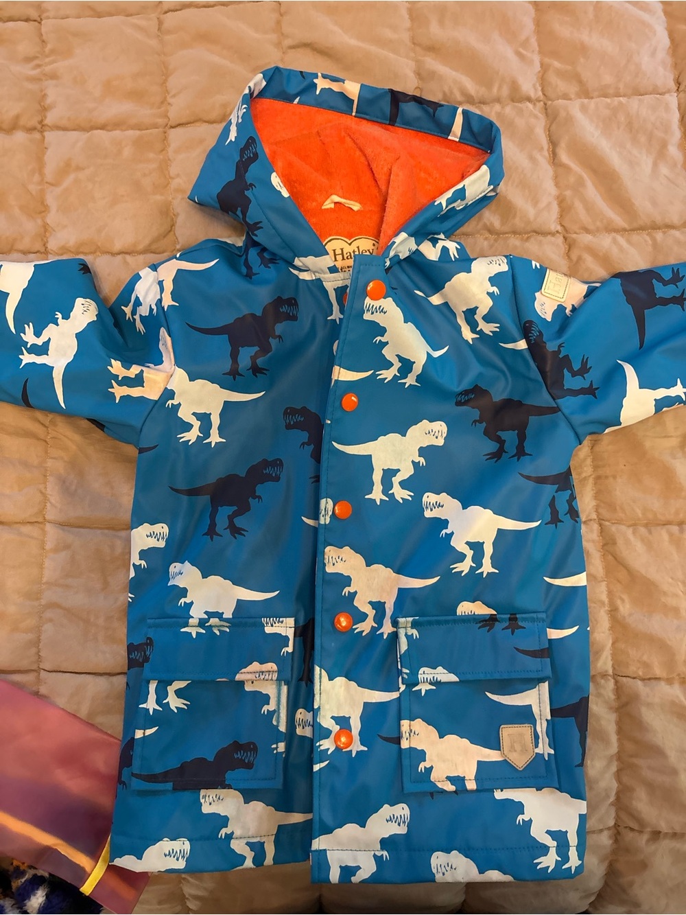 Hatley Blue Dinosaur Hooded Raincoat with Orange Lining